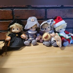 Lot of Four Precious Moments Holiday Dolls